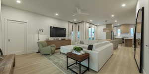 Living area featuring a ceiling fan, light wood-type flooring, and recessed lighting