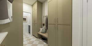 Mudroom with light flooring