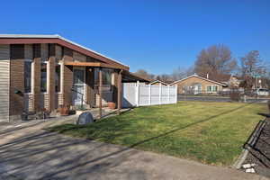 View of yard with a patio area