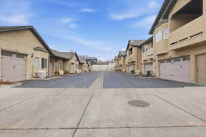 View of concrete road featuring a residential view