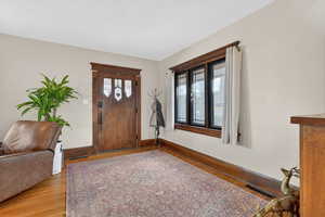 Entrance foyer featuring plenty of natural light and light wood-style flooring
