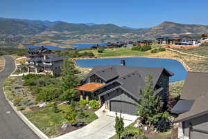 Aerial view of residential area with a water and mountain view