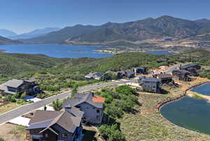 Aerial view of residential area with a water and mountain view