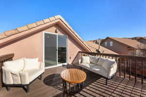 Wooden terrace with outdoor lounge area