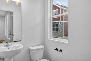 Bathroom featuring toilet and a sink