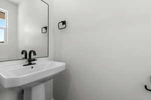 Bathroom featuring a sink