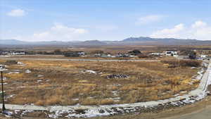 View of mountain backdrop with nearby suburban area