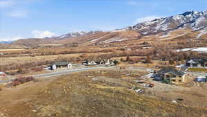 View of mountain backdrop with nearby suburban area