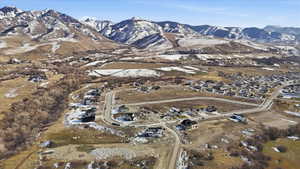 View of property location with nearby suburban area and a mountain backdrop