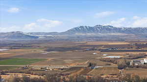 View of mountain background with rural landscape and abundant farmland
