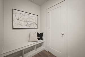 Mudroom with dark wood-style floors