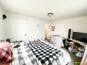 Bedroom with carpet floors and a closet