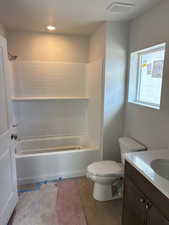 Full bathroom with vanity and tub / shower combination