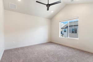 Carpeted empty room with recessed lighting and ceiling fan
