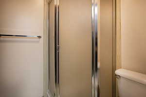 Bathroom view of an enclosed shower