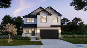 Craftsman inspired home featuring stone siding, a front yard, an attached garage, and concrete driveway