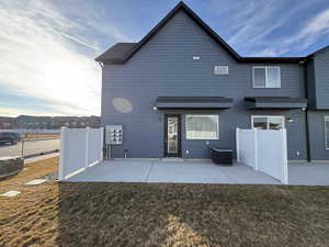 Back of property featuring a patio