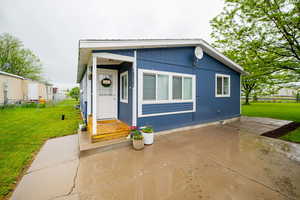 View of front facade featuring a patio