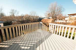 Deck featuring a shed