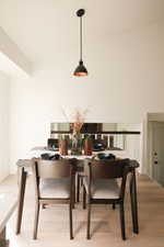 Dining area featuring light wood-style floors