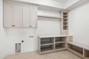 Laundry room with washer hookup and electric dryer hookup