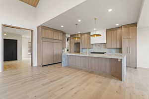 Kitchen featuring panel ready 72" Sub Zero Refrigerator and Freezer