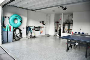 Garage featuring water heater