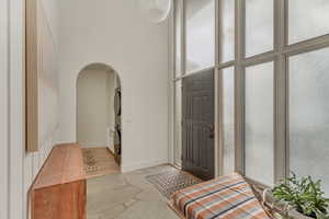 Entrance to property with stacked washer / dryer