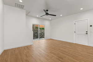 Unfurnished room featuring light wood-style flooring, recessed lighting, and ceiling fan