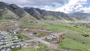 View of mountain background featuring nearby suburban area