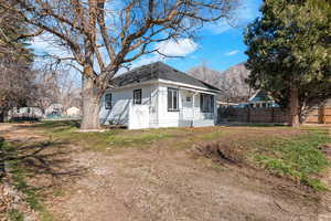 View of front of property featuring a shingled roof and a mountain view