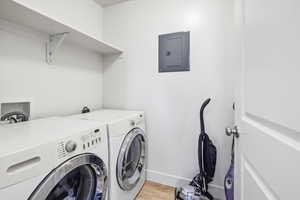 Laundry room featuring built in shelf