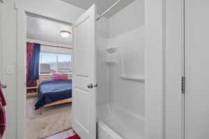 Full bath featuring tub / shower combination