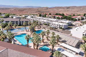 View of property location featuring a mountain backdrop and a pool area