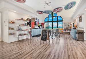 Misc room featuring recessed lighting, a high ceiling, and a ceiling fan