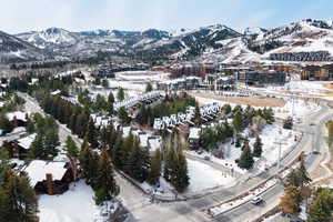 Snowy aerial view with a mountain view