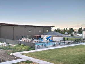View of property's community with a swimming pool