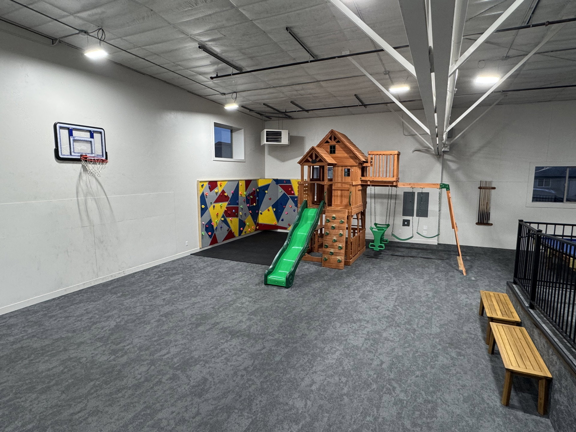 View of playground with a patio area