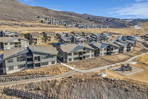 Aerial perspective of suburban area with mountains