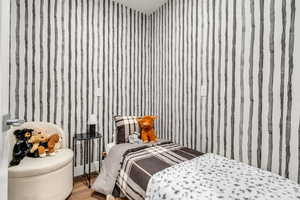 Bedroom featuring wood finished floors