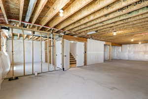 Unfinished below grade area with stairway