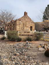 View of property exterior featuring stone siding