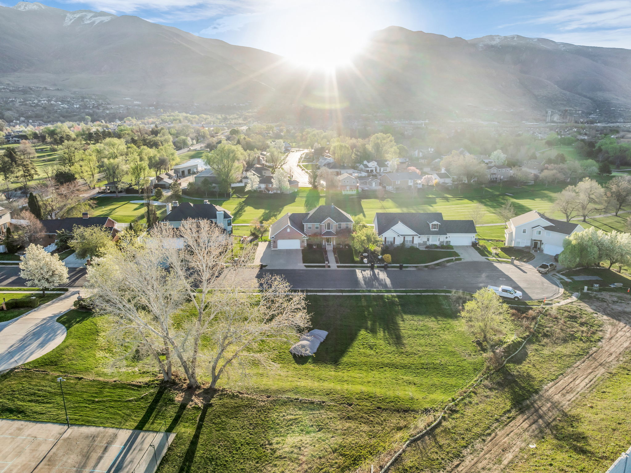 Aerial perspective of suburban area with mountains