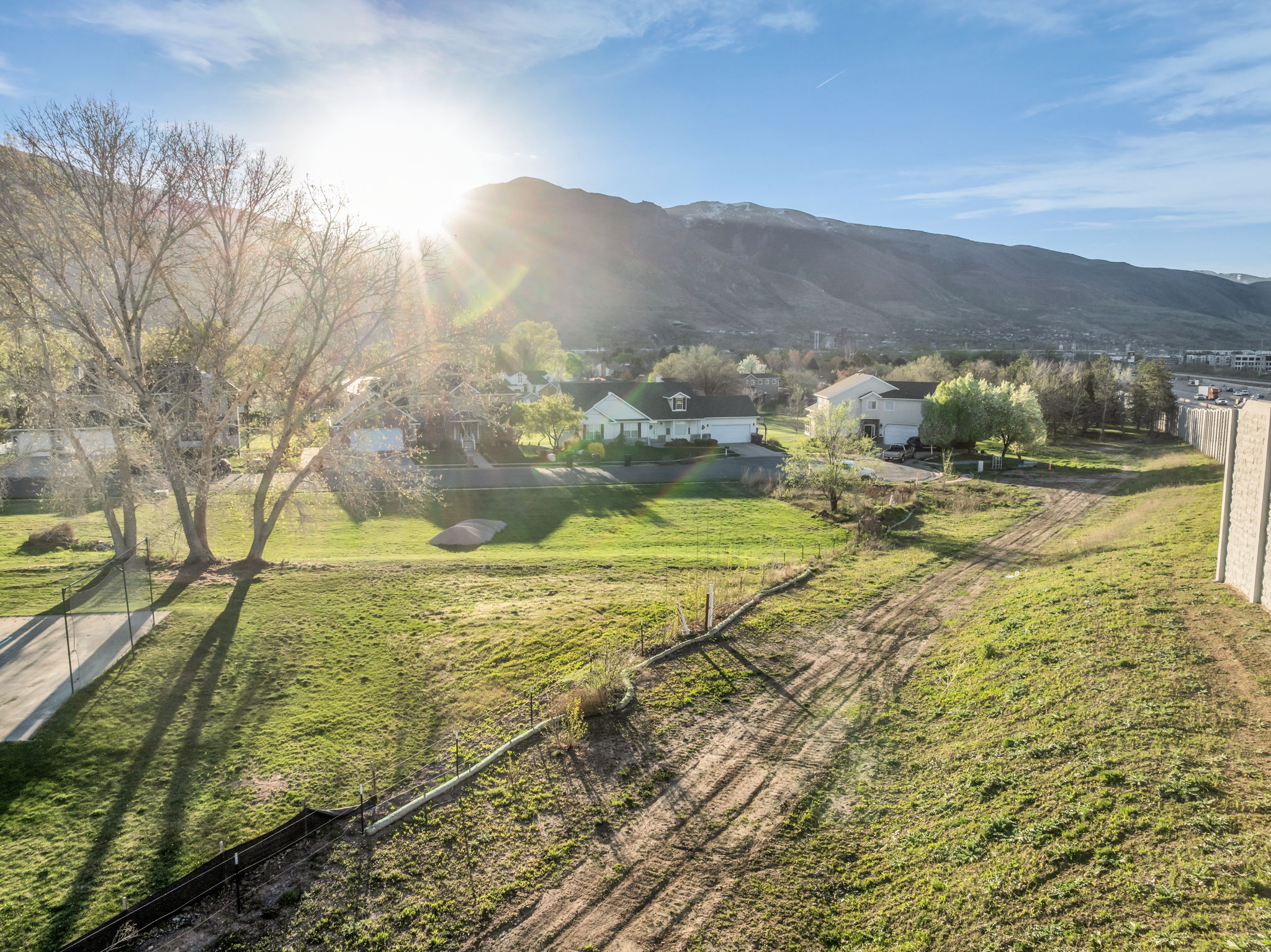 Mountain view featuring nearby suburban area