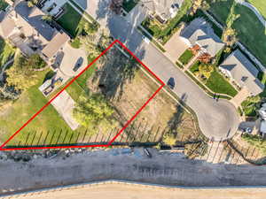 Aerial perspective of suburban area with property boundaries highlighted