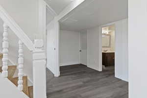Interior space featuring wood finished floors and stairs