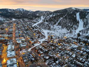 Snowy aerial view featuring a mountain view