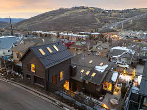 Aerial view of residential area featuring a mountain backdrop