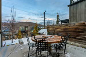 View of patio with outdoor dining space and a residential view