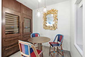 Dining area featuring baseboards and light tile patterned floors